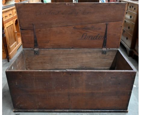 An antique hardwood trunk, carved inscription to underside of hinged top 'Charles Forbes esq, Devonshire House, London', 114 