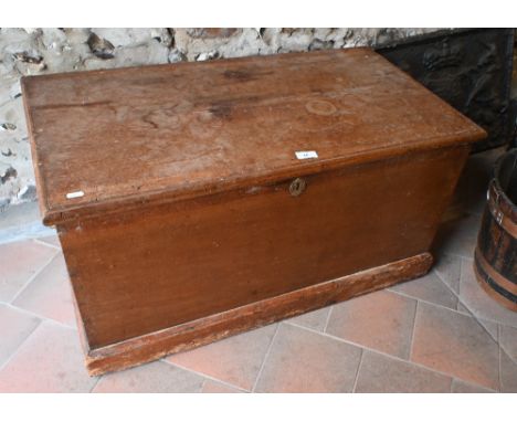 An old pine trunk with brass fittings 