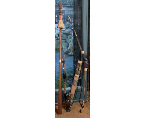 A blow-pipe with quiver of arrows, to/w other ethnic weaponry