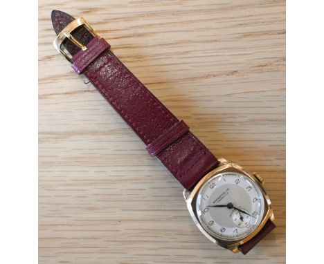 A vintage gents Winegartens Ltd 9ct gold manual wristwatch, the champagne dial with Arabic numerals, black hands and secondar