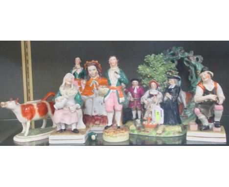 A collection of ceramic figural groups, to include Staffordshire courting couple seated under a bower, girl feeding ducks by 