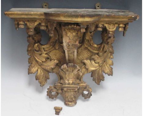 A continental carved gilt wood wall bracket, late 19th century,34 x 36 x 14cm