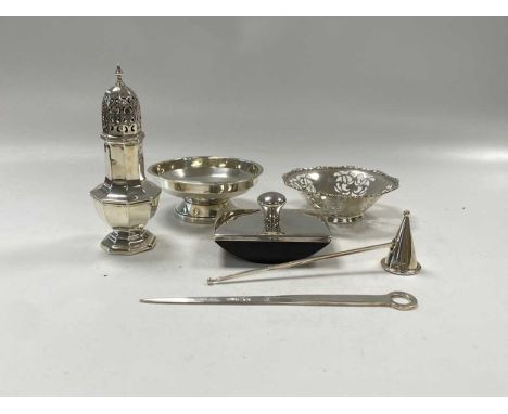 A small collection of silverware including 2 bowls, caster, candlesnuffer , roller blotter and a letter opener modelled as a 