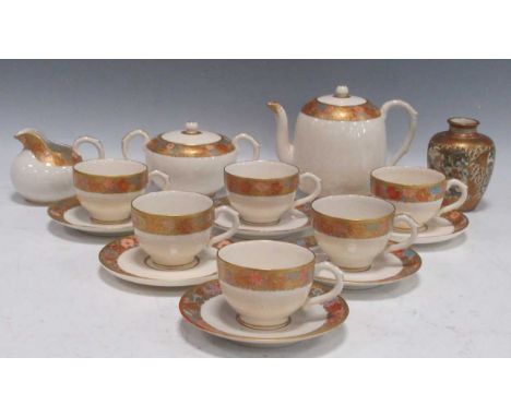 A Satsuma tea service for six and a miniature Satsuma vasecrazing to all itemsrubbing to edge of 3 saucersrubbing to gilding 