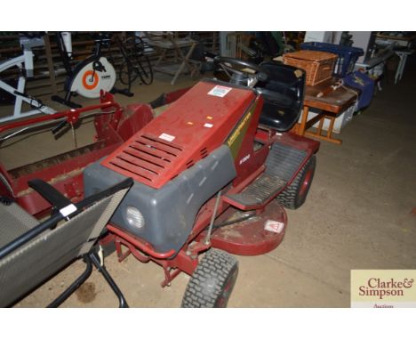 A Lawn Master Honda engine ride-on lawn mower with grass collector and box
