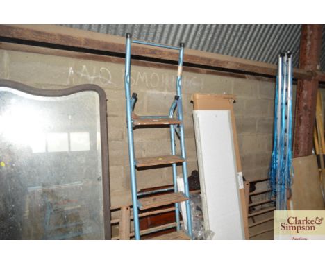A wooden and metal step ladder