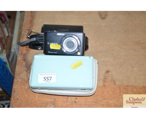 A Lumix digital camera together with a Nintendo DS
