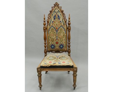 A Victorian tapestry covered rosewood Gothic Revival chair