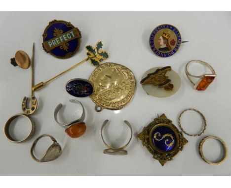 A small quantity of various jewellery, including rings, enamel brooches, etc.