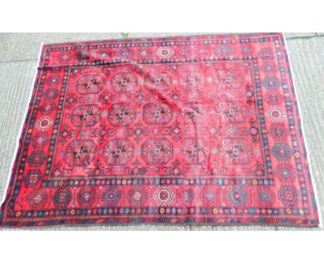 A Turkmen carpet 244 x 198