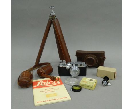 A Leica 111a camera (serial number 304311), in full working order (picture tested), in maker's original leather case with Sum