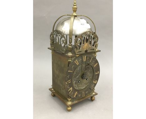 An 18th century style brass lantern clock