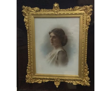 A late 19th century Female Portrait on milk glass, gilt framed and further boxed frame