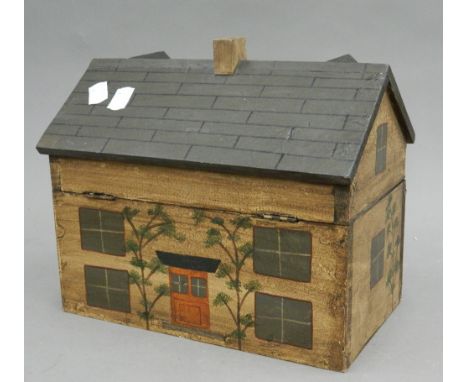 A tea caddy formed as a house