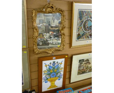Framed group of six ceramic tiles showing a campana pot of flowers and a gilt framed wall mirror