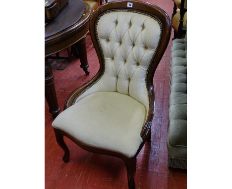 Reproduction mahogany button upholstered spoon back chair