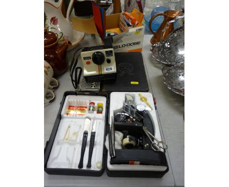 Polaroid land camera and associated material, an early 19th Century Welsh Bible having dated entries from 1843 and a child's 
