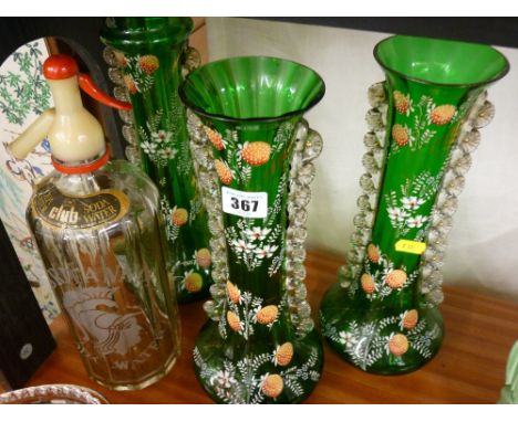 Three green glass enamel decorated vases and a Britannia advertising soda water syphon
