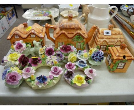 Four pieces of cottage tableware and a collection of ceramic floral posies