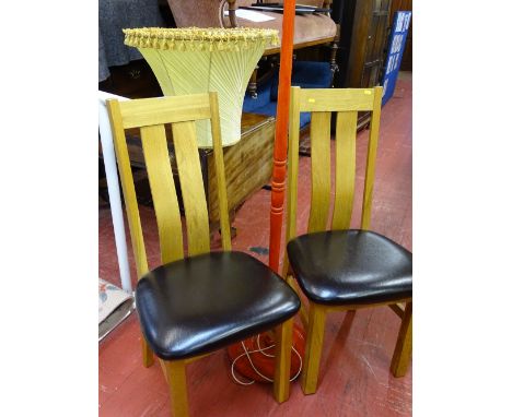 Pair of ultra modern high back oak and leather effect seated side chairs and a red stained standard lamp with shade