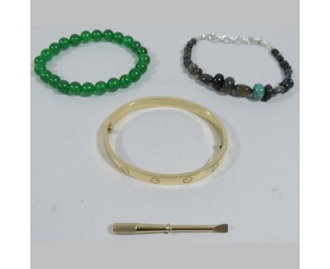 An opal bracelet, together with a jade bead bracelet and a plated bangle