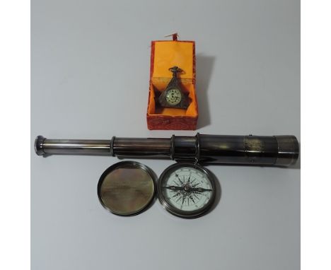 A reproduction Masonic watch, together with a telescope and compass 