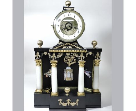 A 19th century ebonised mantel clock, of architectural form, having a three train movement, striking on a gong, 59cm tall