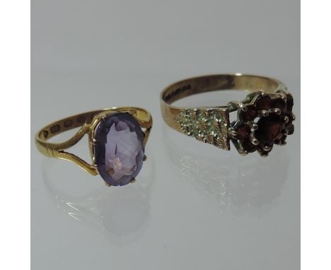A 9 carat textured gold and garnet cluster ring, together with a 22 carat gold ring