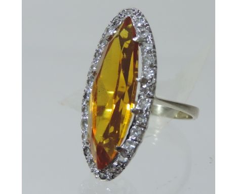 An 18 carat white gold citrine and diamond ring 