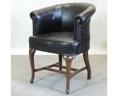 An early 20th century Globe Wernicke upholstered desk chair, on cabriole legs