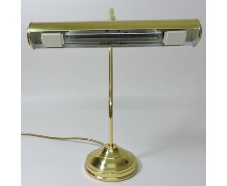 A brass desk lamp