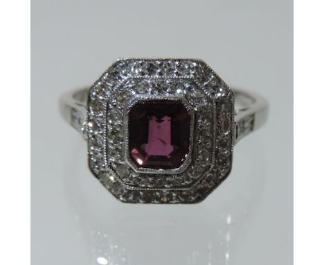 A platinum, ruby and diamond target ring 