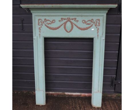 A cast iron fire surround, 106cm