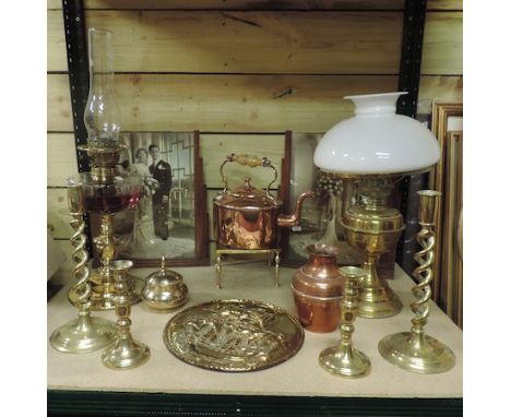 A collection of brass and copper to include an oil lamp, another, and a lantern with slides