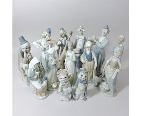 A collection of Nao and other continental figures, tallest 29cm