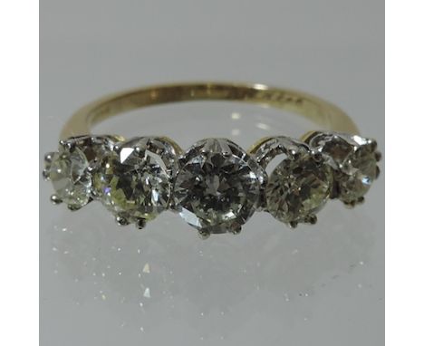 An 18 carat gold five stone diamond ring, approx. 2 carats