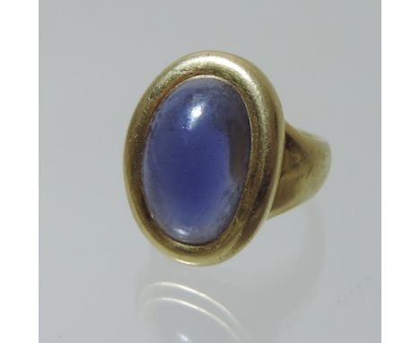 An 18 carat gold iolite ring, signed and numbered Cartier 