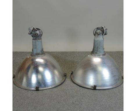 A pair of large industrial light fittings, 59cm diameter