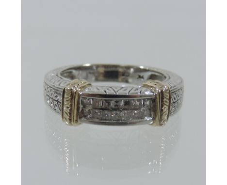 A 9 carat two colour gold ring