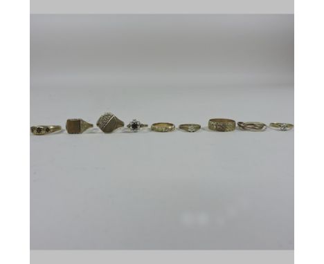 A collection of 9 carat gold rings, to include a garnet and seed pearl ring, signet rings and bands (9)