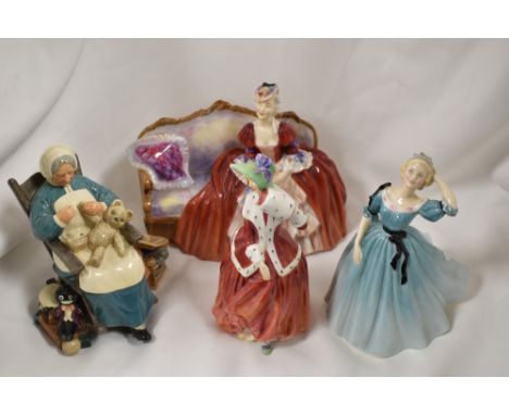 Four Royal Doulton figurine studies including Christmas Morn, Nanny, Celeste and Bell O The Ball.