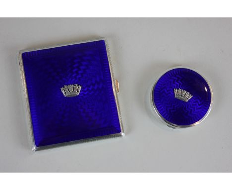 A George VI silver and blue enamel cigarette case, maker John William Barrett, Birmingham 1939, together with a similar compa