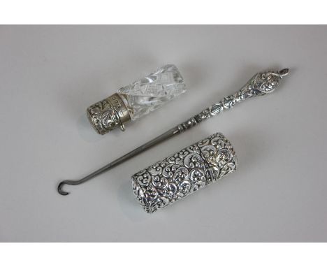 A Victorian silver topped scent bottle, a silver plated sewing kit and a button hook