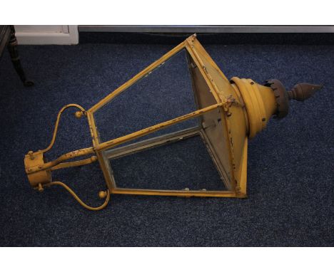 A yellow painted copper street lamp (missing column) with two glass panels, 114cm tall