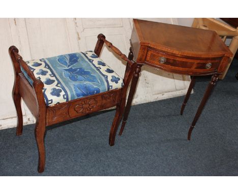 A mahogany bow front side table with single drawer, on reeded tapered legs, together with a piano stool with upholstered seat