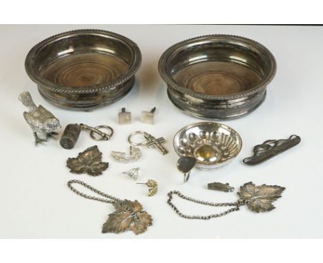 A small collection of silver and silver plated items to include bottle coasters, wine taster, decanter labels....etc. 