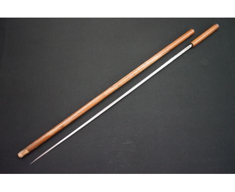 A early 20th century sword stick with hallmarked silver top, blade marked Toledo. 