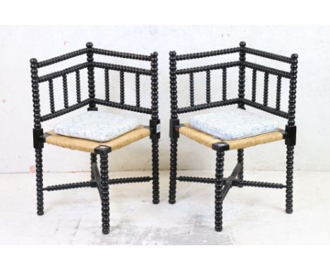 Pair of 19th century Bobbin Corner Chairs with rush seats, each 39cm wide x 72cm high 