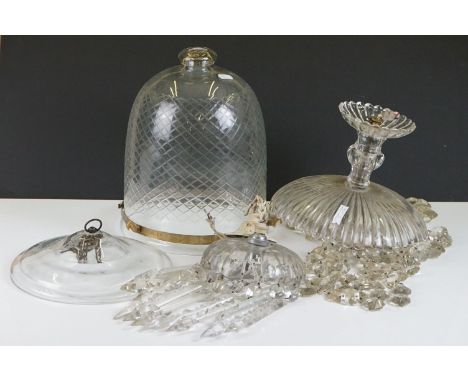 A small group of three glass light fittings with crystal droplets. 