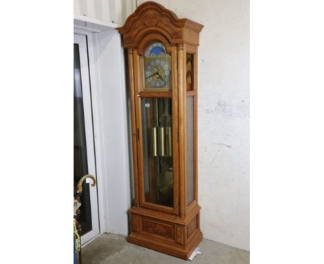 Contemporary Golden Oak Longcase Clock, the arched hood holding the brass and silvered arched face with a lunar dial and seco